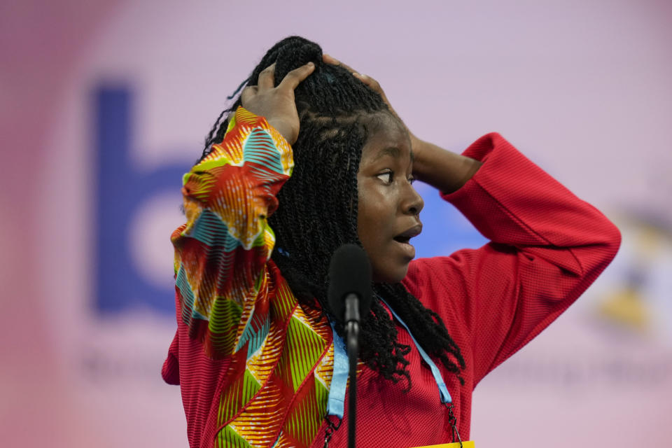 Janice Nketsiah, 12, from Accra, Ghana, reacts as she competes during the Scripps National Spelling Bee, Tuesday, May 30, 2023, in Oxon Hill, Md. (AP Photo/Alex Brandon)