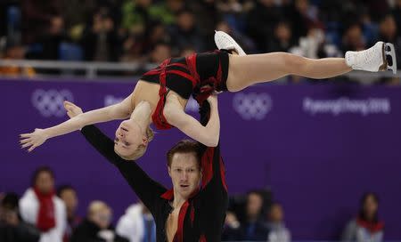 Figure Skating – Pyeongchang 2018 Winter Olympics – Team Event Pair Skating short program – Gangneung Ice Arena - Gangneung, South Korea – February 9, 2018 - Evgenia Tarasova and Vladimir Morozov, Olympic athletes from Russia, compete. REUTERS/John Sibley