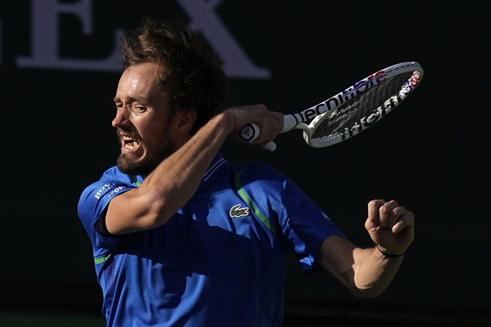 Daniil Medvedev, of Russia, returns a shot to Alejandro Davidovich Fokina, of Spain, at the BNP Paribas Open tennis tournament Wednesday, March 15, 2023, in Indian Wells, Calif. (AP Photo/Mark J. Terrill)