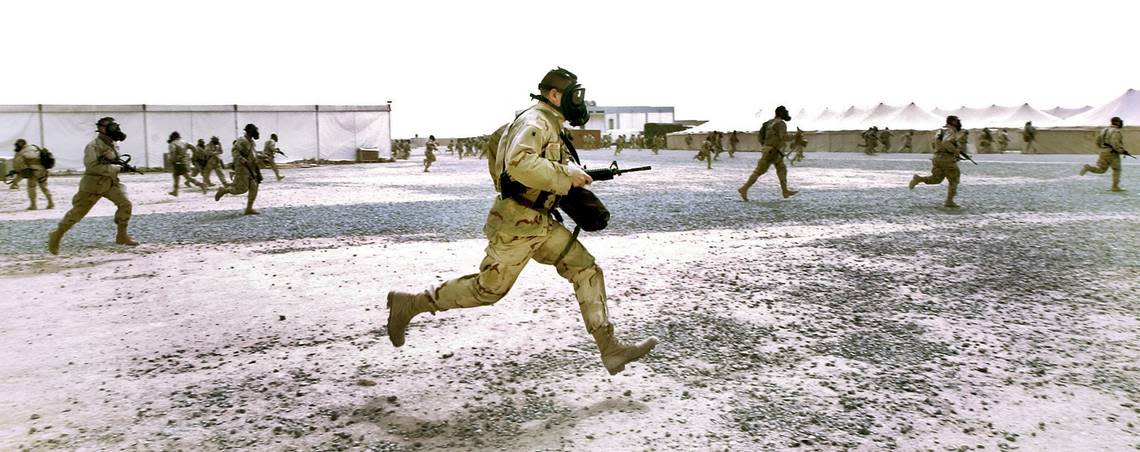 82nd Airborne soldiers sprint for bunkers at All American City TAA Camp Champion as sirens blare the second scud warning of the day.