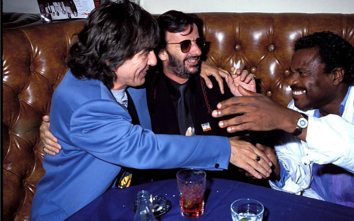 Billy Preston with Ringo Starr and George Harrison in 1990 - FilmMagic