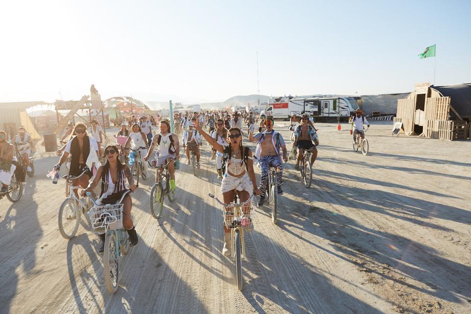 The 100-person bike procession at Burning Man wedding