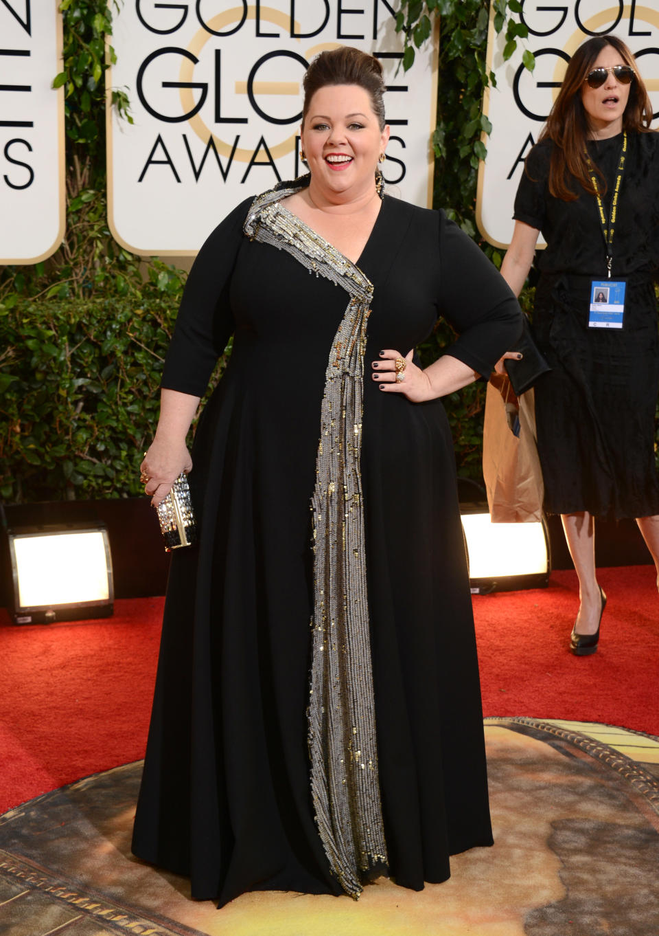 Melissa McCarthy arrives at the 71st annual Golden Globe Awards at the Beverly Hilton Hotel on Sunday, Jan. 12, 2014, in Beverly Hills, Calif. (Photo by Jordan Strauss/Invision/AP)