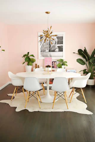 <p><a href="https://abeautifulmess.com/ikea-docksta-table-hack/" data-component="link" data-source="inlineLink" data-type="externalLink" data-ordinal="1">A Beautiful Mess</a></p>