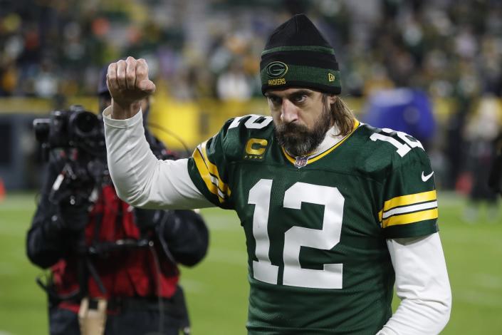 Green Bay Packers' Aaron Rodgers reacts as he walks off the field after an NFL football game against the Los Angeles Rams Sunday, Nov. 28, 2021, in Green Bay, Wis. The Packers won 36-28. (AP Photo/Matt Ludtke)