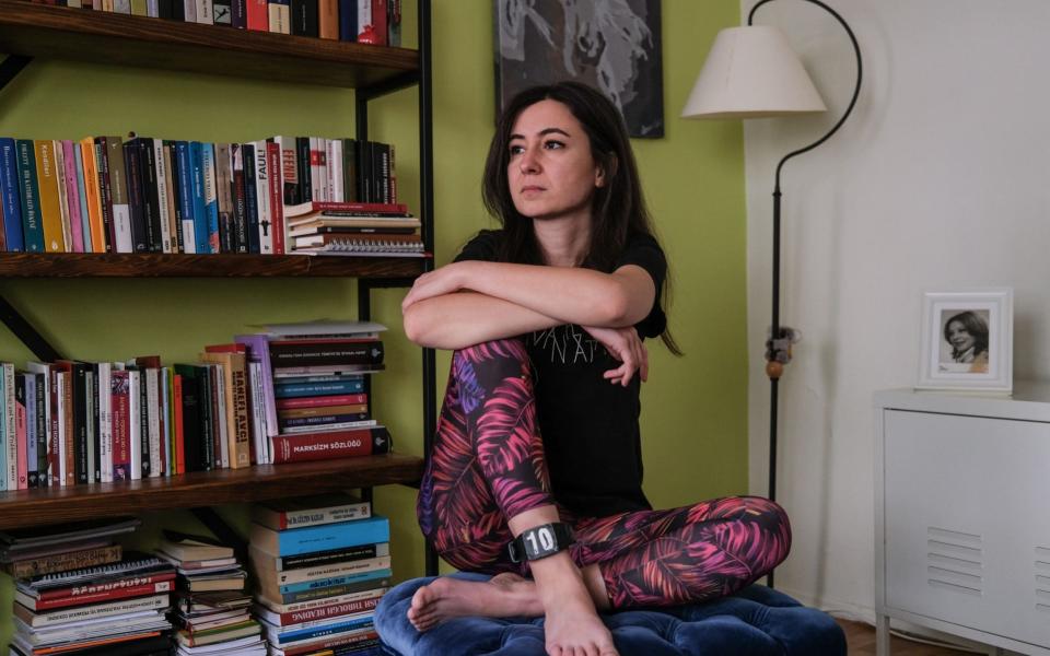 Psychologist Melis Akyurek protested against the student arrests this month and is now subject to house arrest and wears an electronic bracelet around her ankle - EPA