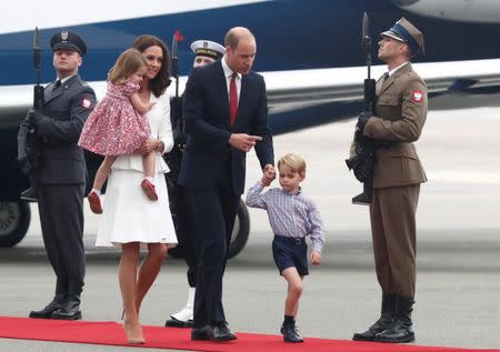 Prince William, the Duke of Cambridge, his wife Catherine, The Duchess of Cambridge, Prince George and Princess Charlotte arrive at a military airport in Warsaw, Poland July 17, 2017. REUTERS/Kacper Pempel