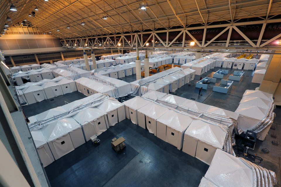 A temporary hospital has been set up in the Ernest N. Morial Convention Center, as overflow for local hospitals that are reaching capacity, in response to the COVID-19 pandemic, in New Orleans, April 4. Phase one of the operation can house 1,000 patients with the capability to double that capacity as needed. (Photo: Gerald Herbert/Associated Press)