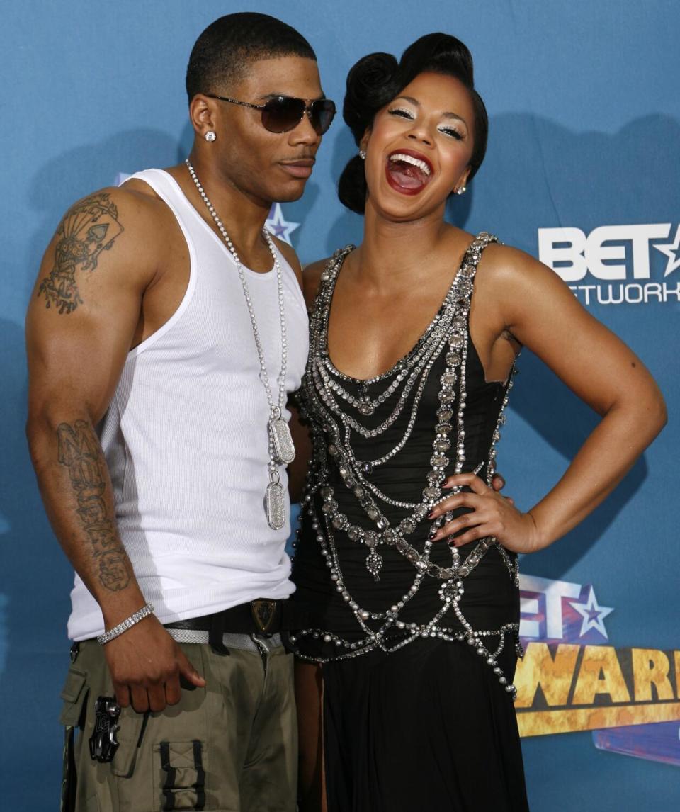 Rapper Nelly and Ashanti pose backstage at the BET Awards