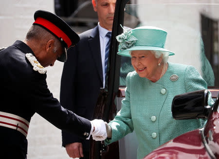 Britain's Queen Elizabeth arrives to visit a replica of one of the original Sainsbury's stores in London, Britain May 22, 2019. REUTERS/Hannah Mckay