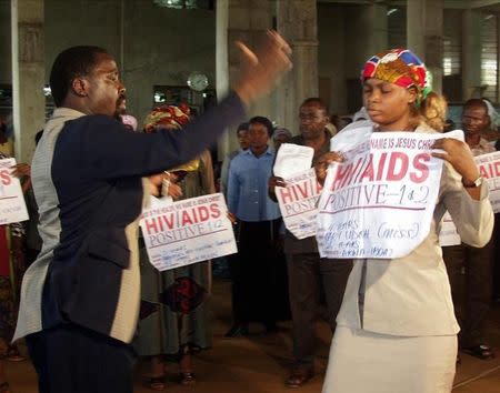 "miraculous healing" from Prophet T.B. Joshua of the synagogue Church For All Nations during a service at Ikotun-Egbe district in Lagos, file photo. REUTERS/George Esiri