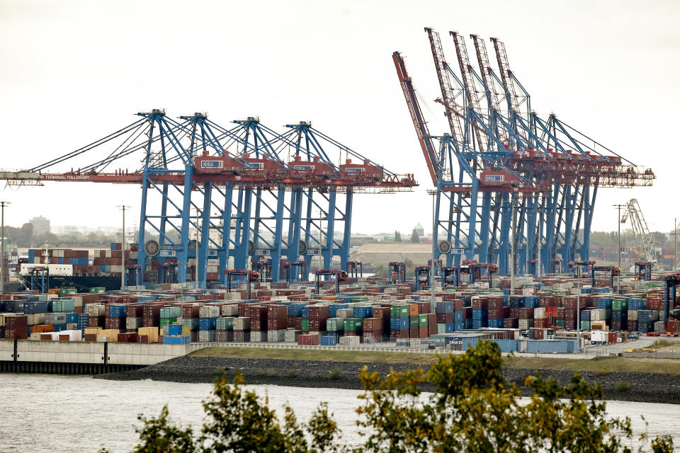 HAMBURG, GERMANY - OCTOBER 20: The container Terminal Toller Ort is seen in port on October 20, 2021 in Hamburg, Germany. Hamburg Port, Germany's largest container shipping port, is facing complications due to global container shipping disruption. Some shipping companies are sending their cargo ships to other German ports because they fear their ships will get stuck in marine traffic in the Elbe river leading to Hamburg. Domestic shipping is being disrupted because containers are not leaving from and arriving at Hamburg on schedule, leading to waiting times of up to a week, with only a third of ships arriving on time. Retailers in Germany are concerned whether they will have adequate stock of merchandise in time for the upcoming Christmas shopping season. (Photo by Morris MacMatzen/Getty Images)