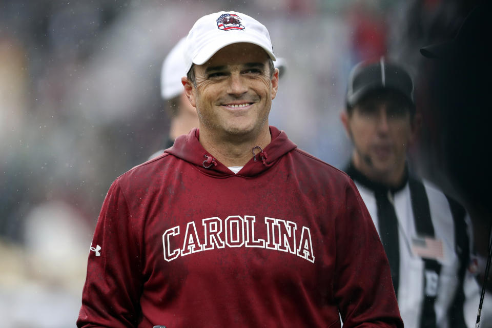 FILE - South Carolina head coach Shane Beamer is all smiles after taking a 13-0 lead during the first half of an NCAA college football game against Vanderbilt, Saturday, Nov. 11, 2023, in Columbia, S.C. South Carolina's best playmakers on offense the past two years are all gone, meaning this spring is a search for consistency and production from an attack that had its struggles last season. The Gamecocks were 5-7 and missed the postseason for the first time in coach Beamer's three seasons. (AP Photo/Artie Walker Jr., File)
