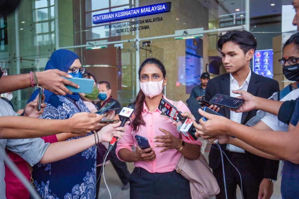 Contract doctor at Hospital Shah Alam Dr B. Abirami speaks to the media after a townhall session between the Health Ministry and contract doctors in Putrajaya February 22, 2023. — Picture by Shafwan Zaidon