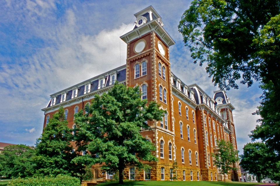 Arkansas: Old Main was the first permanent building erected on the University of Arkansas campus. The south tower contains a clock and the north tower houses the bell.