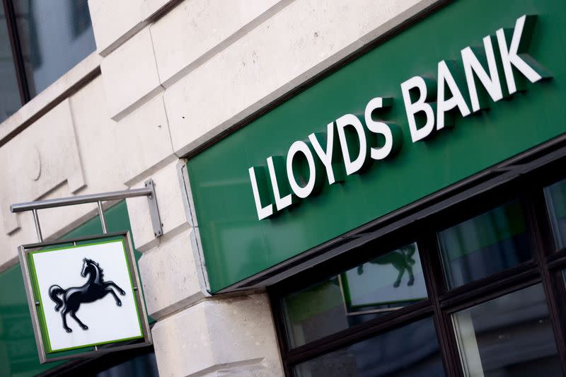 FILE PHOTO: General view of signage at a branch of Lloyds bank, in London