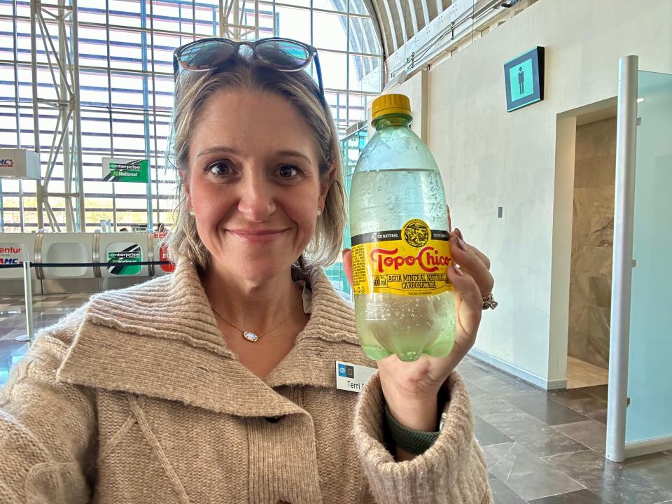 Terri Peters with a bottle of Topo Chico.