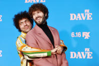 <p>Costars Benny Blanco and Dave Burd pose together on the red carpet for the season 2 premiere of <i>Dave</i> on June 10 at The Greek Theatre in L.A. </p>