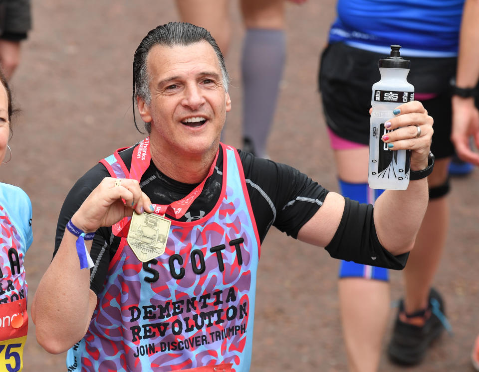 LONDON, ENGLAND - APRIL 28: Scott Mitchell poses with his medal after completing the Virgin London Marathon 2019 on April 28, 2019 in London, United Kingdom. (Photo by Karwai Tang/WireImage)