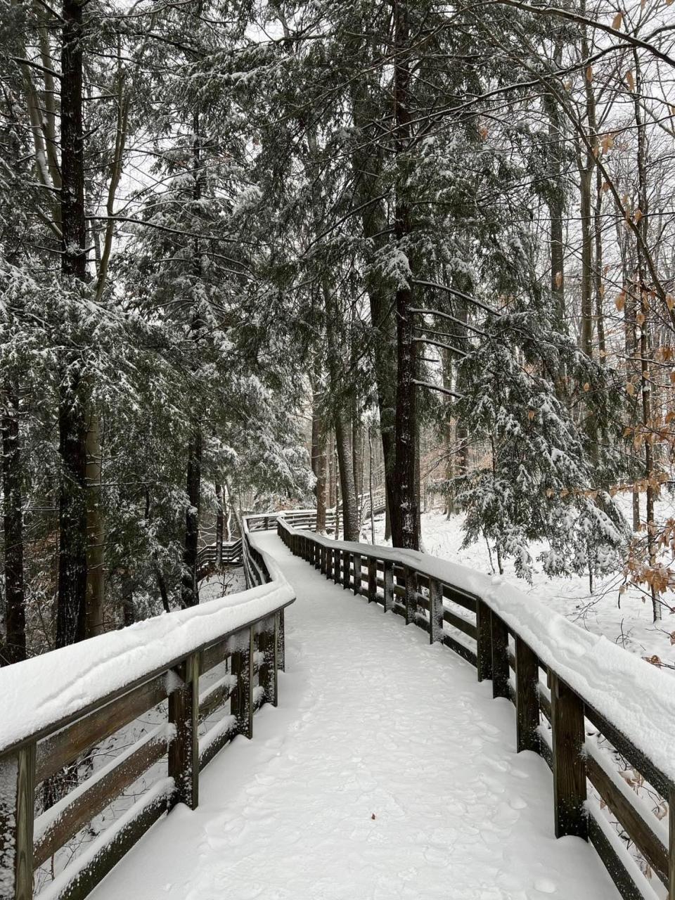 Snow adds to the scenery for winter hikes on trails like this one at Brandywine Gorge at Cuyahoga Valley National Park.