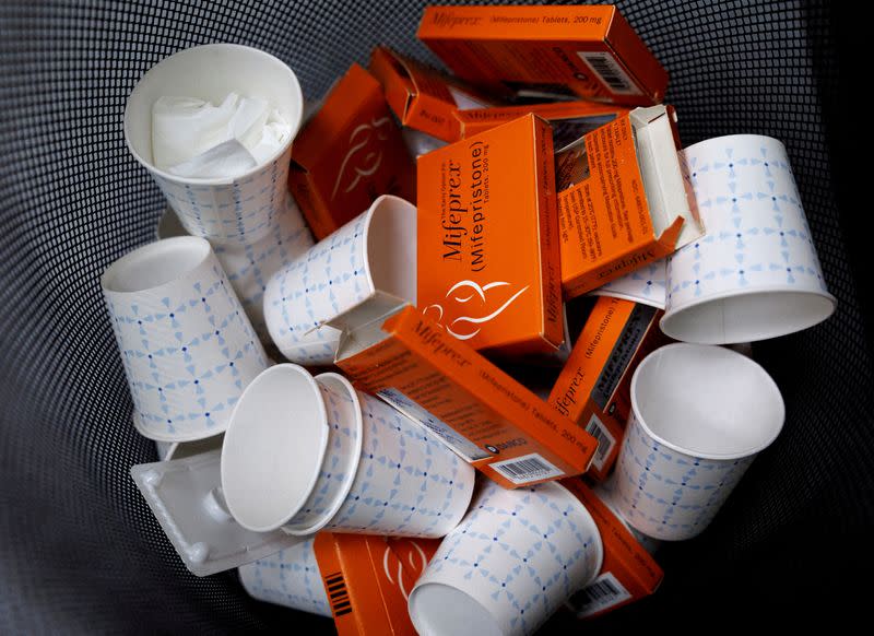 FILE PHOTO: Used boxes of Mifepristone pills, the first drug used in a medical abortion, fill a trash can at Alamo Women's Clinic in New Mexico