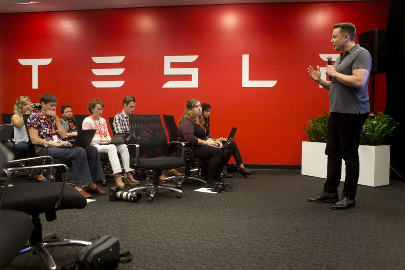 FILE PHOTO: Tesla CEO Elon Musk speaks about new Autopilot features during a Tesla event in Palo Alto