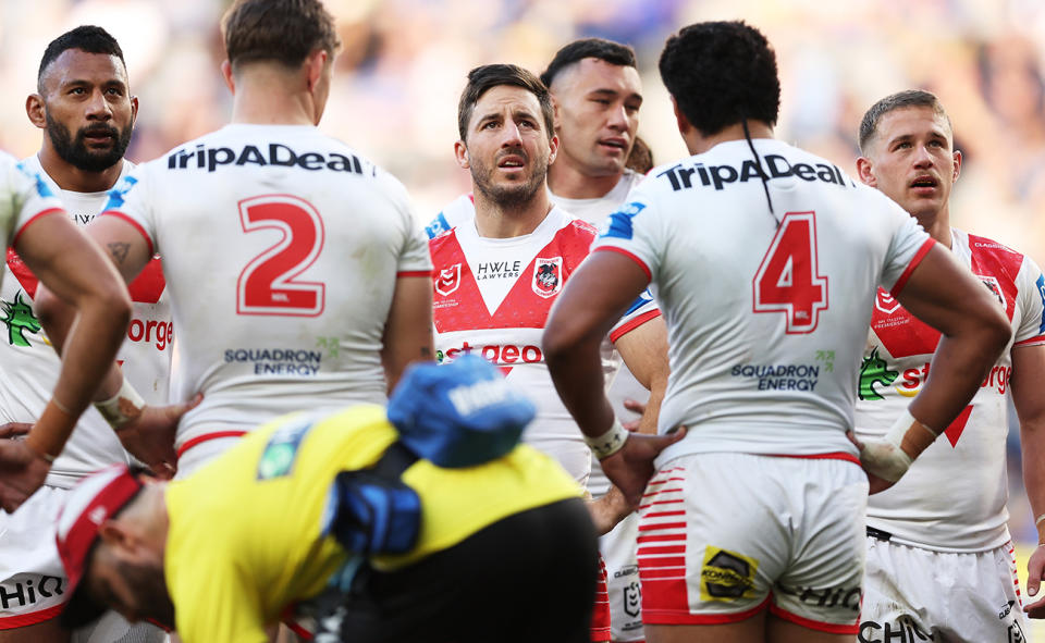 Ben Hunt with Dragons teammates during a game.