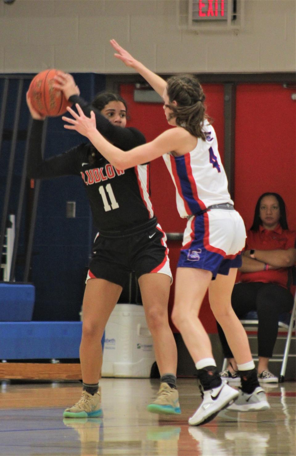 Ludlow senior Mylee Garrett, with ball, is the Division III player of the year.