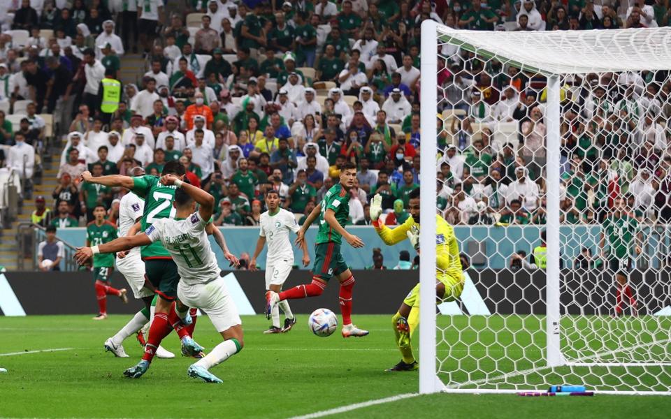 Mexico's Henry Martin scores their first goal - Matthew Childs/Reuters