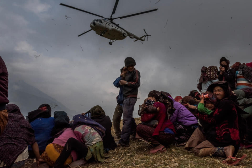 A helicopter delivers relief supplies