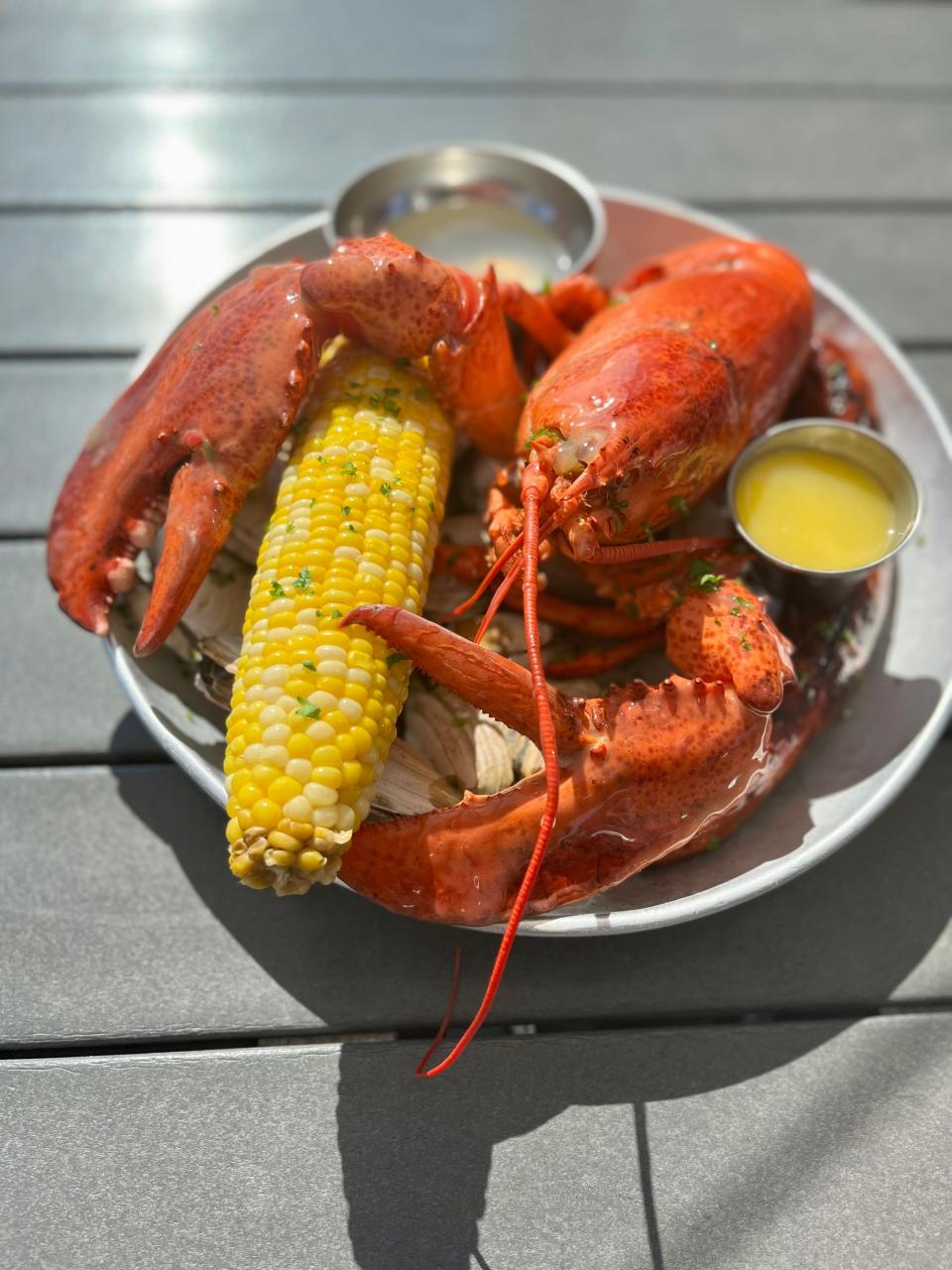 The Bucket from The Lobster Trap  is described as the ultimate Cape Cod experience.