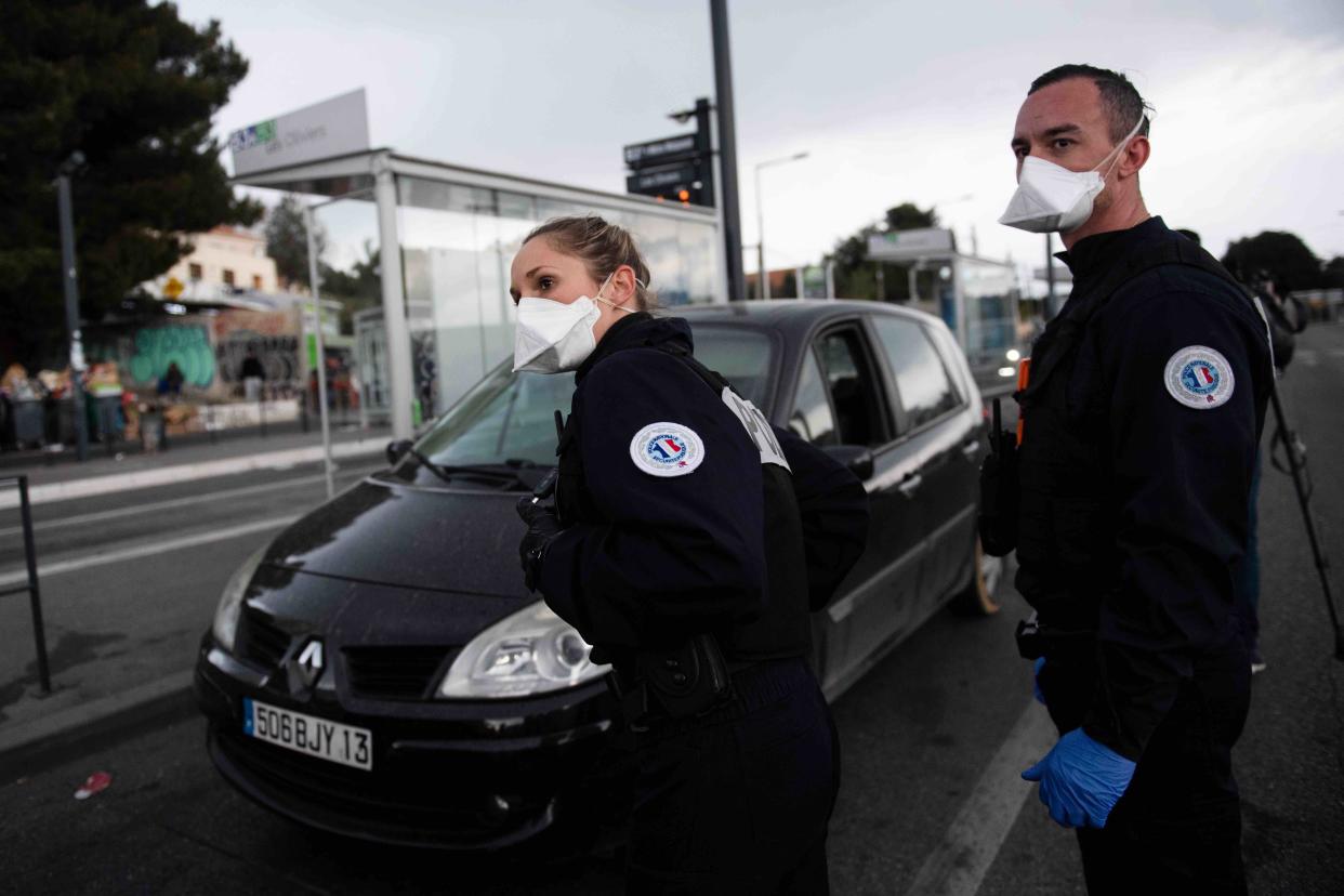 Votre attestation s'il vous plait  (Photo by CLEMENT MAHOUDEAU/AFP via Getty Images)