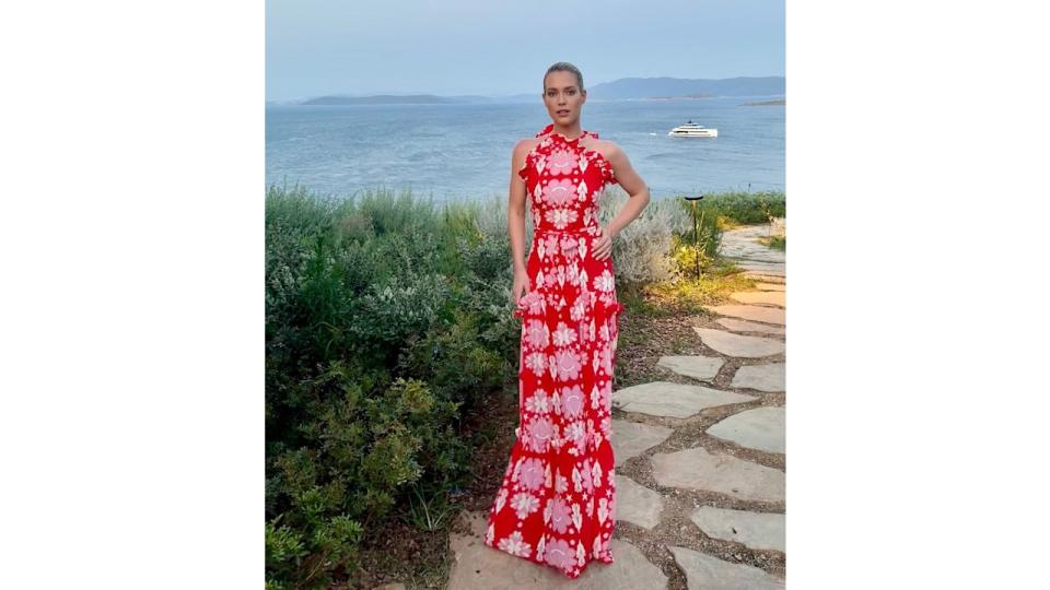 Amelia spencer at sunset in red patterned dress