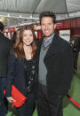HOLLYWOOD, CA - FILE: Actors Alyson Hannigan (L) and Alexis Denisof arrive at the premiere of Walt Disney Pictures' "The Muppets" held at the El Capitan Theatre on November 12, 2011 in Hollywood, California. Alyson Hannigan and husband Alexis Denisof are expecting their second child. (Photo by Mark Davis/Getty Images)