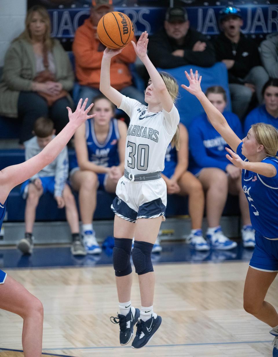 Autumn Boutwell (30) shoots during the Jay vs Central girls basketball game at Central High School in Milton on Friday, Jan. 13, 2023.