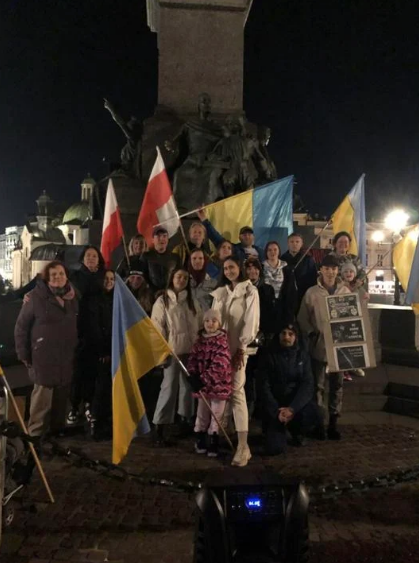 Muskegon teacher Bob Wood stands with Ukrainians and Polish citizens at the main square of Old Town Krakow in Poland in 2022.