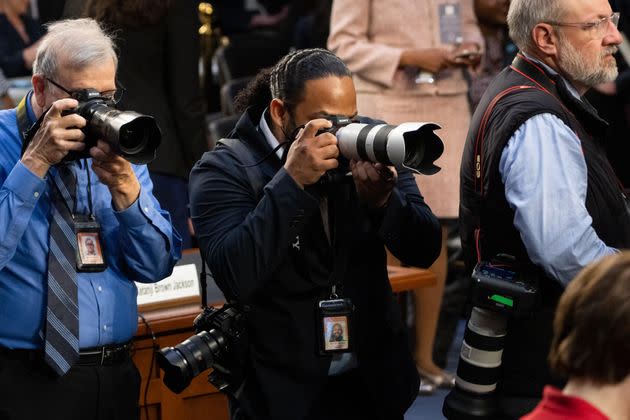 Jarrad Henderson photographs Jackson's hearing. (Photo: Sarahbeth Maney/The New York Times)