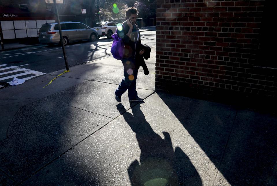 Emergency room doctor Dr. Joseph Habboushe, who is taking on the challenge of treating patients with the new coronavirus, poses for photos Monday, April 6, 2020, in New York. He says health care workers are all in the fight together. (AP Photo/Bebeto Matthews)