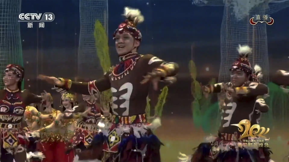 In this image taken from video footage run by China's CCTV via AP Video, dancers in blackface and costumes portraying Africans perform on stage during the Spring Festival Gala, one of the world's most-watched TV programs in Beijing on Friday, Feb. 12, 2021. (CCTV via AP)