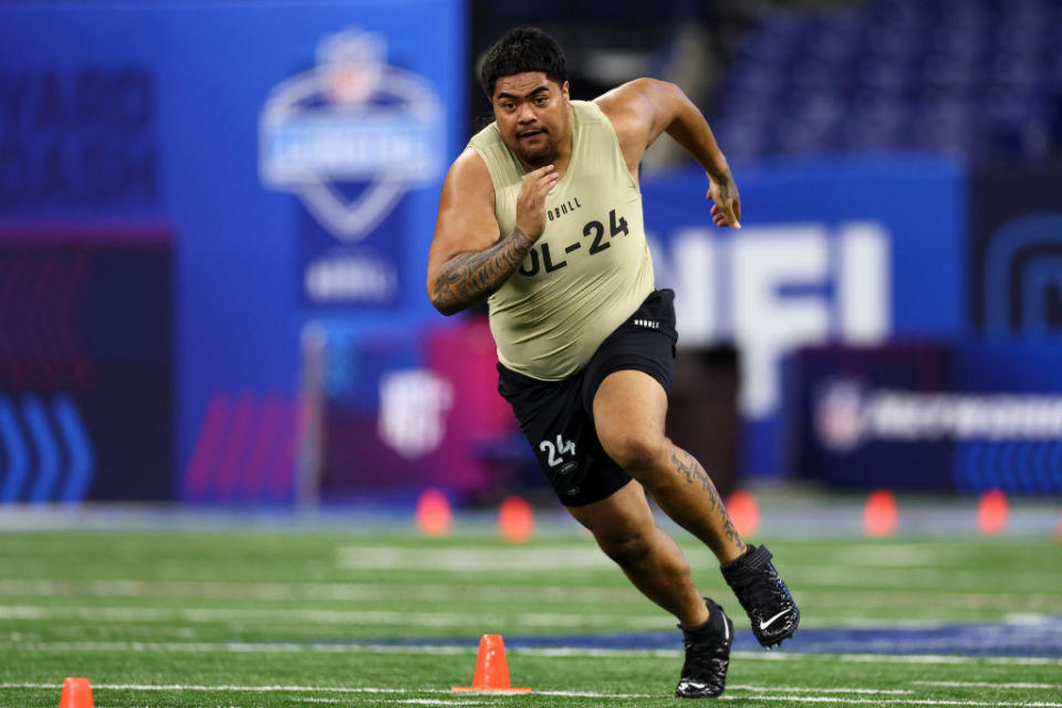 Taliese Fuaga of Oregon State participates in a drill during the NFL Combine at the Lucas Oil Stadium on March 3, 2024 in Indianapolis, Indiana. / Credit: Kevin Sabitus / Getty Images