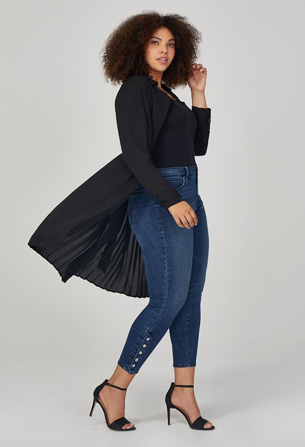 <p>Rebel brings a refreshing take on plus size clothes with this flattering black trench coat with a long pleated back for $199.</p>