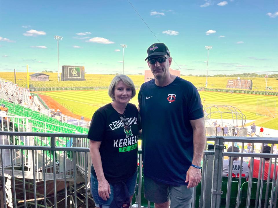 Barb and Dan Mullenbach of Waukee stand for a photo at the Field of Dreams in Dyersville on Tuesday, Aug. 9. Their son Matt pitched an inning of scoreless relief that night for the Cedar Rapids Kernels in the first minor-league baseball game played at the iconic site.