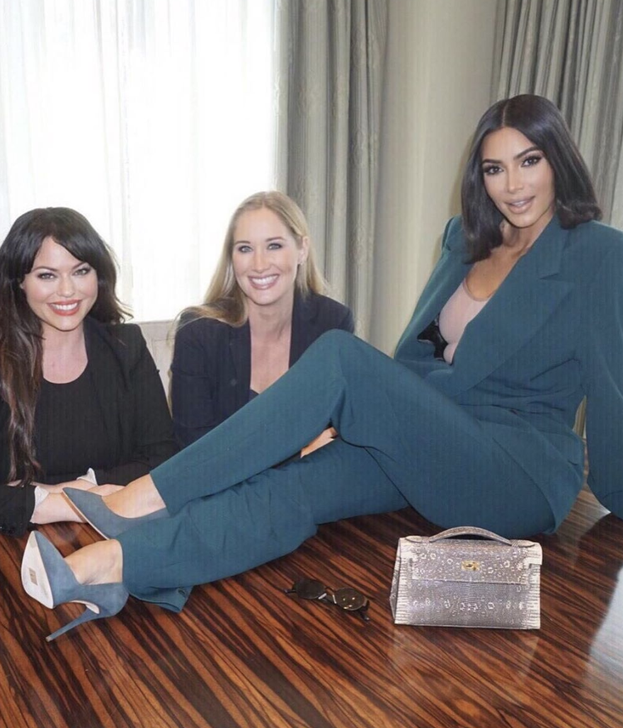 Kim Kardashian posed on a table in the photos she shared. (Photo: Instagram via Kim Kardashian)