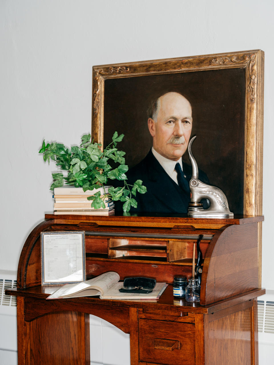 A portrait of the town of Kemmerer's namesake, the coal magnate Mahlon S. Kemmerer, at the Hamsfork Museum, in Kemmerer, Wyo., June 8, 2024. Bill Gates has poured $1 billion into a project in Wyoming coal country that aims to build the first in a new generation of nuclear reactors that produce emissions-free electricity. (Benjamin Rasmussen/The New York Times)