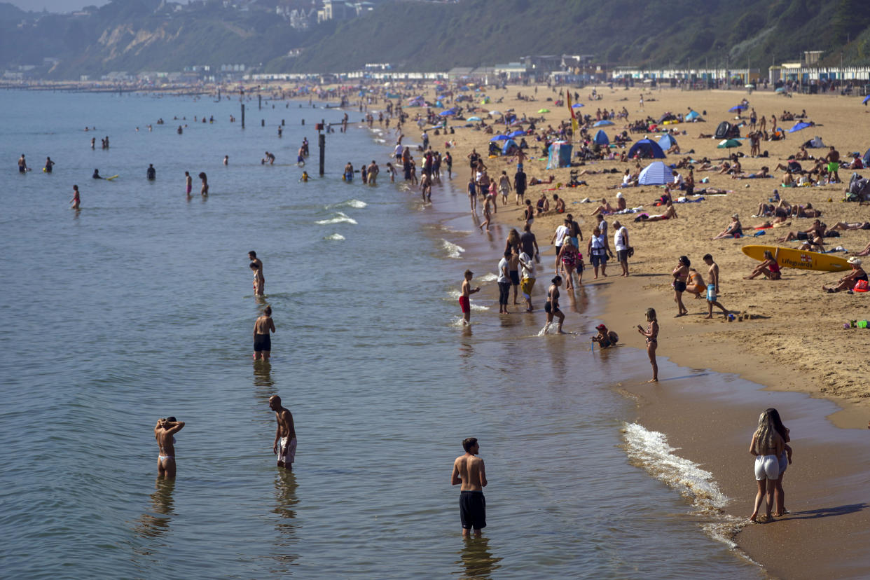 People enjoy the warm weather on Bournemouth Beach in Dorset. Picture date: Monday September 6, 2021.