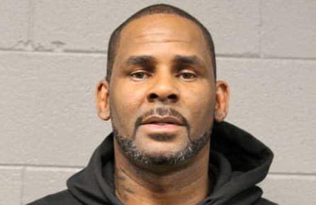 <div class="inline-image__caption"><p>R. Kelly in a booking photo after his arrest in February.</p></div> <div class="inline-image__credit">Cook County Sheriff</div>