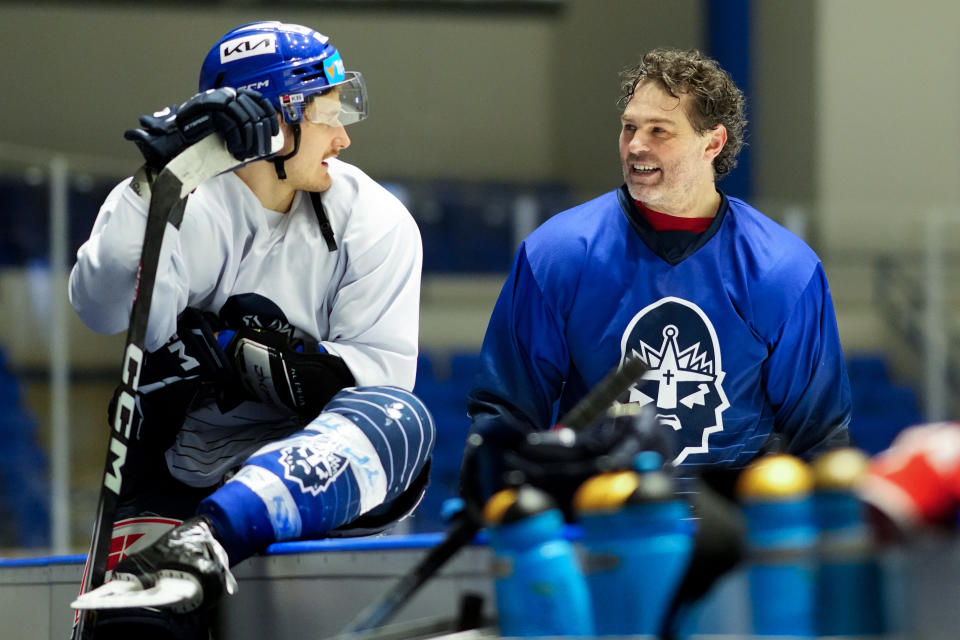 Jaromir Jagr, right, talks to his teammates during a practice session of his team Kladno Knights in Kladno, Czech Republic, Thursday, Feb. 8, 2024. Jagr will have to miss a game or two while he's in Pittsburgh to see his No. 68 jersey raising to the rafters at PPG Paints Arena. Just three days after the right-winger turns 52, the Penguins will retire two-time Stanley Cup champion's number at a pre-game ceremony on Sunday Feb. 18, 2024. (AP Photo/Petr David Josek)