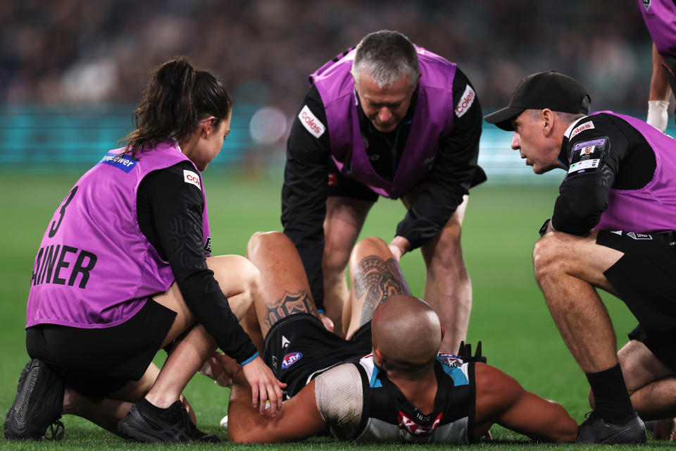 ADELAIDE, AUSTRALIA - APRIL 26: Sam Powell-Pepper of the Power is injures his knee during the 2024 AFL Round 07 match between the Port Adelaide Power and the St Kilda Saints at Adelaide Oval on April 26, 2024 in Adelaide, Australia. (Photo by James Elsby/AFL Photos via Getty Images)
