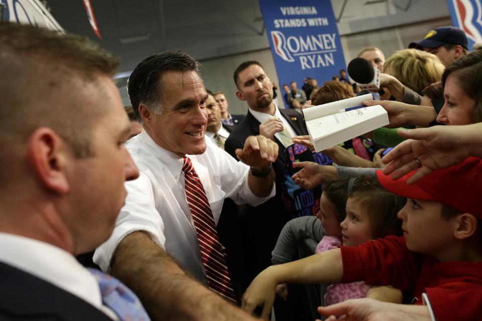 Republican presidential candidate, former Massachusetts Gov. Mitt Romney greets supporters as he campaigns at Meadow Event Park, in Richmond, Va., Thursday, Nov. 1, 2012. (AP Photo/Charles Dharapak)
