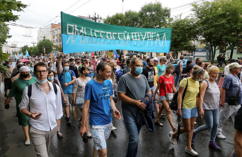 People take part in a rally in support of former regional governor Sergei Furgal in Khabarovsk